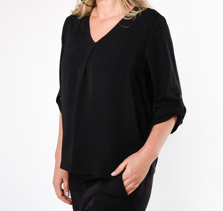 Blusa negra holgada