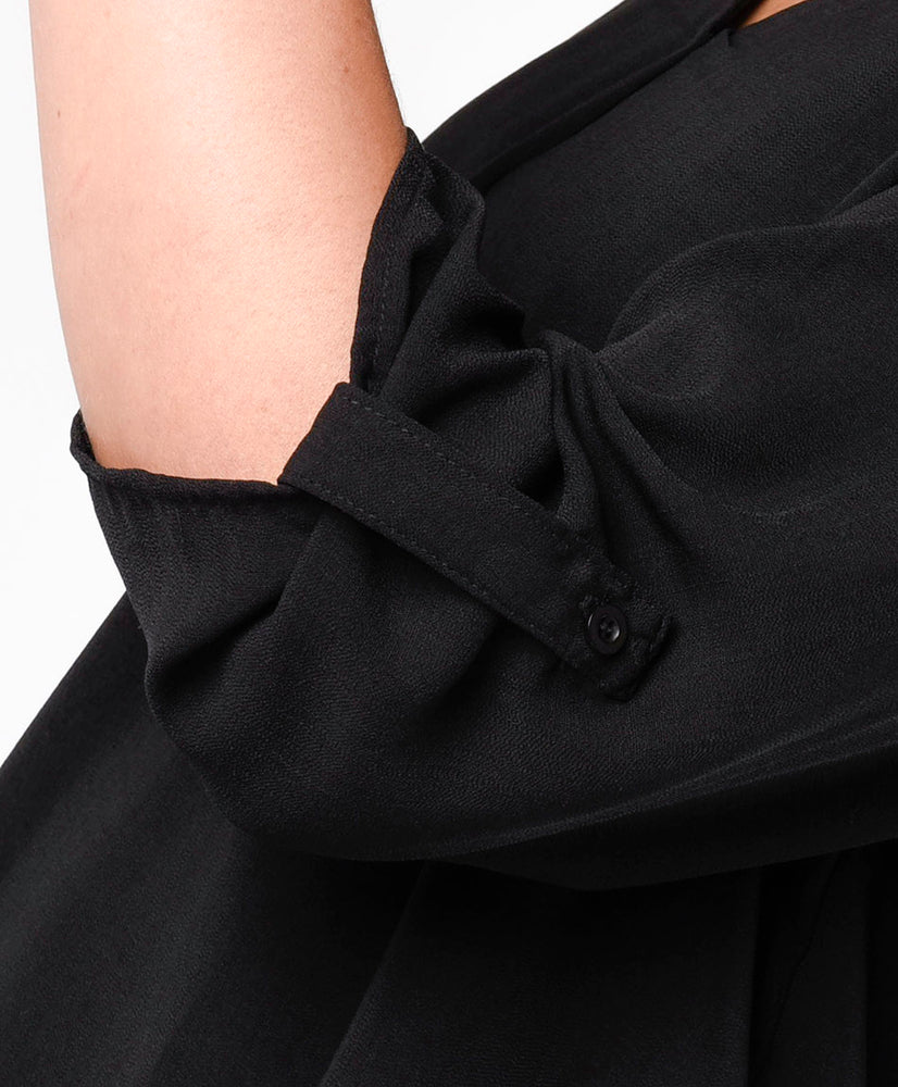Blusa negra holgada