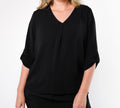 Blusa negra holgada