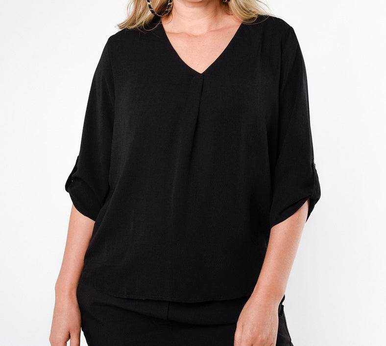 Blusa negra holgada