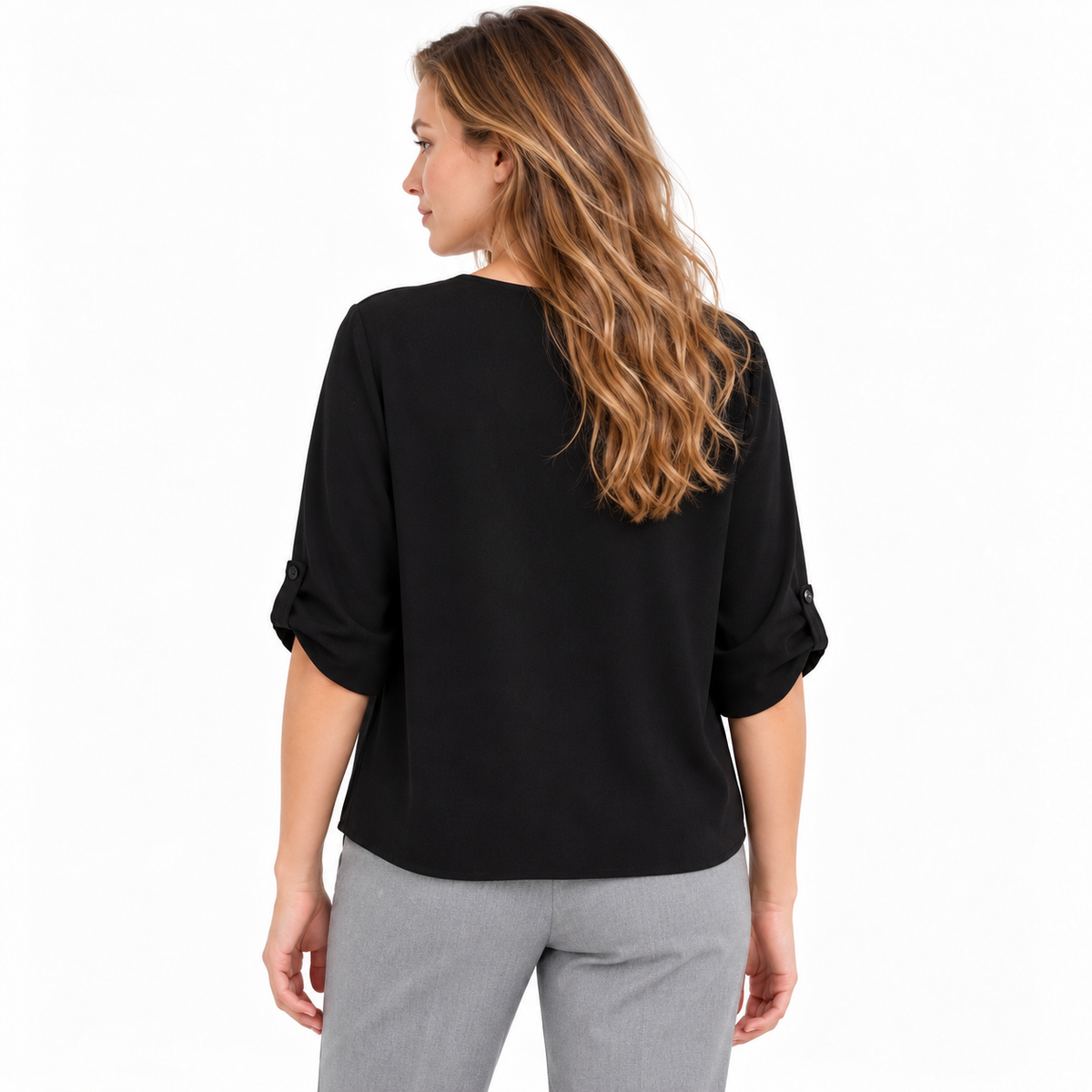 Blusa negra holgada, vista de espalda