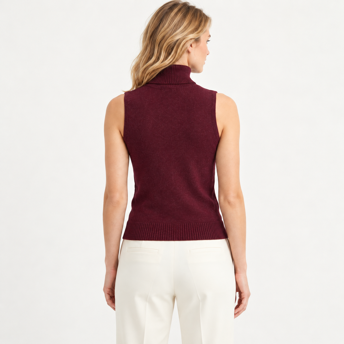 Blusa sin mangas cuello tortuga — espalda